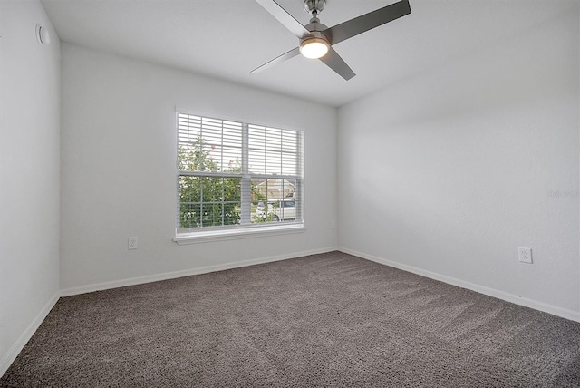 4505 Hummingbird Ln, Haines City, FL 33844 - spare room featuring carpet and a ceiling fan