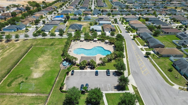 4505 Hummingbird Ln, Haines City, FL 33844 - aerial overview of property's location featuring a pool area and nearby suburban area