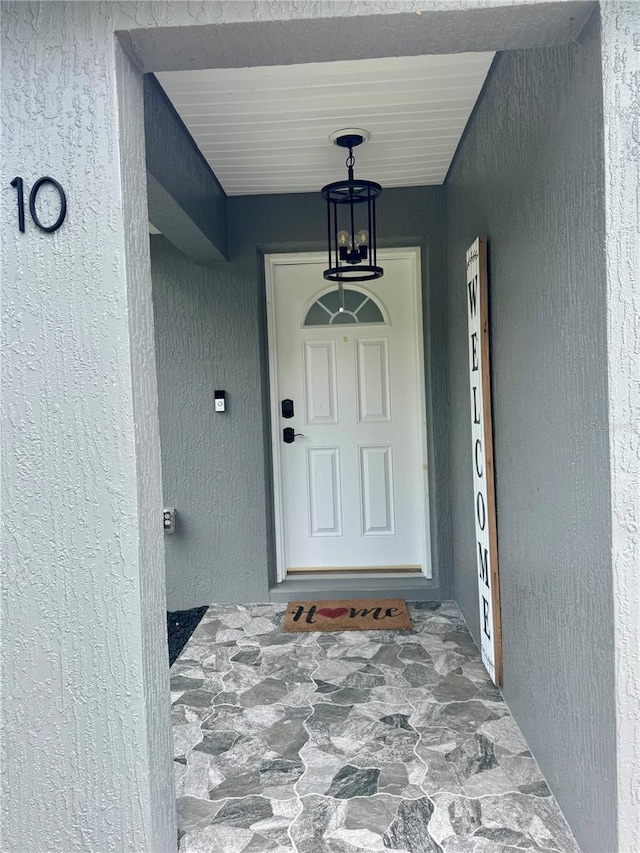 10 Pine Track Trl, Ocala, FL 34472 - property entrance featuring stucco siding