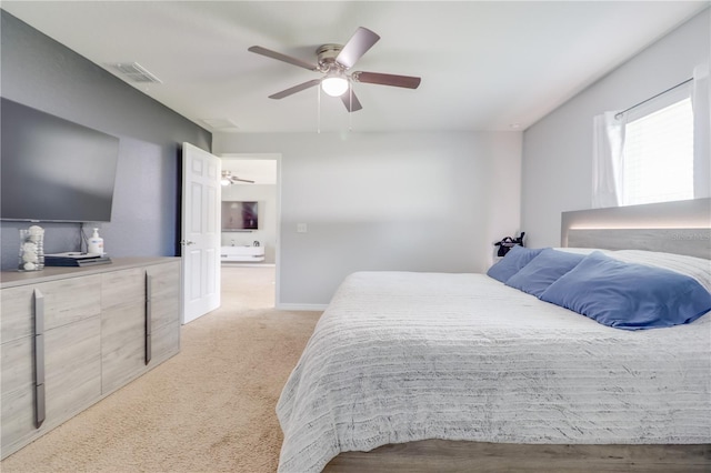 10 Pine Track Trl, Ocala, FL 34472 - bedroom featuring light carpet and a ceiling fan