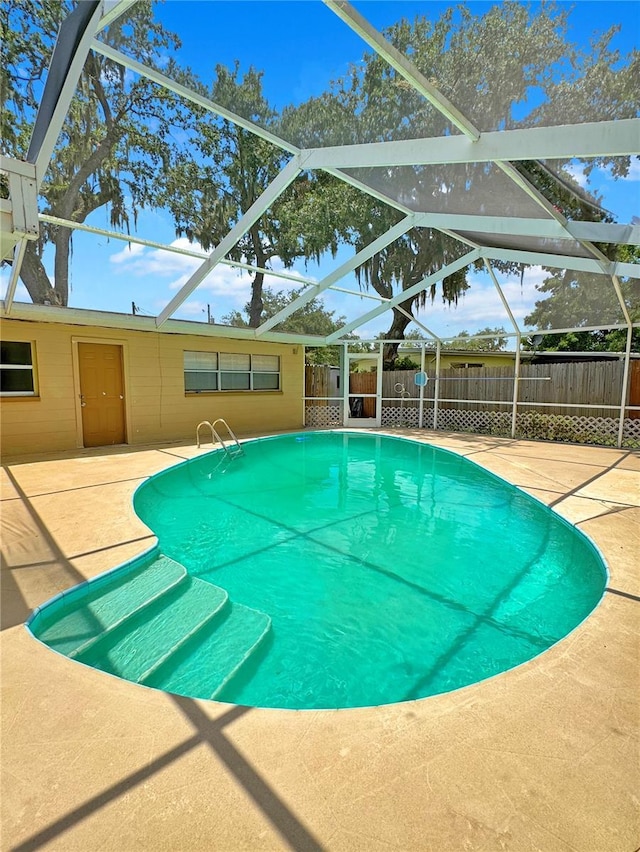 760 Bearcreek Dr, Bartow, FL 33830 - view of pool featuring a patio area and glass enclosure