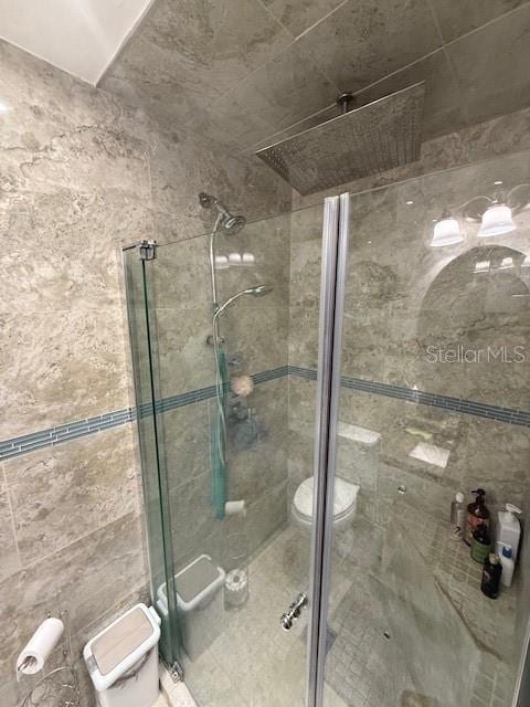 2013 Marilyn Ave, Winter Haven, FL 33881 - bathroom with toilet and a shower stall