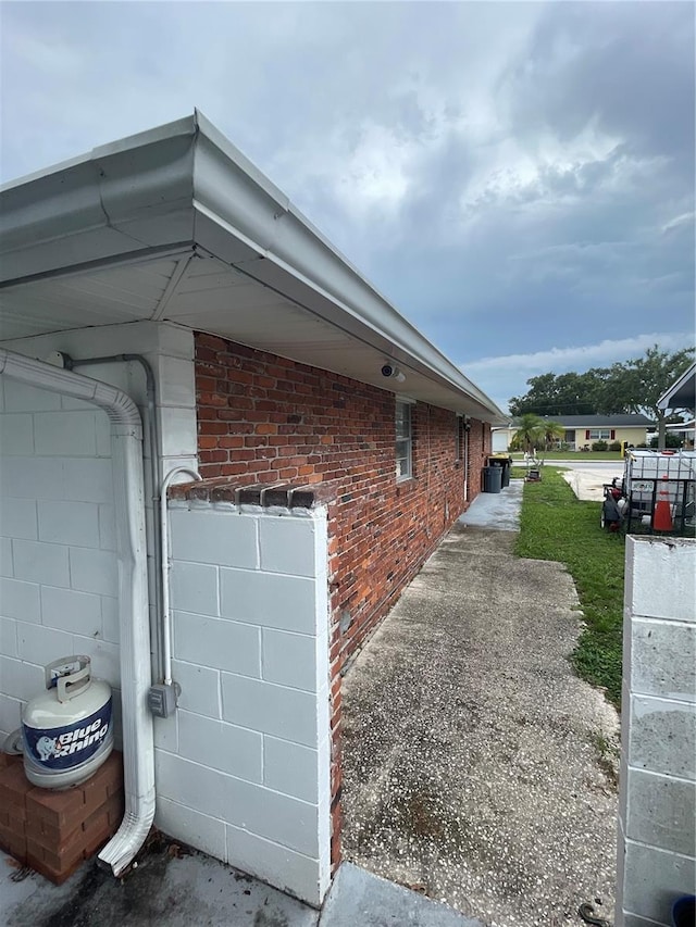 2013 Marilyn Ave, Winter Haven, FL 33881 - view of home's exterior with brick siding