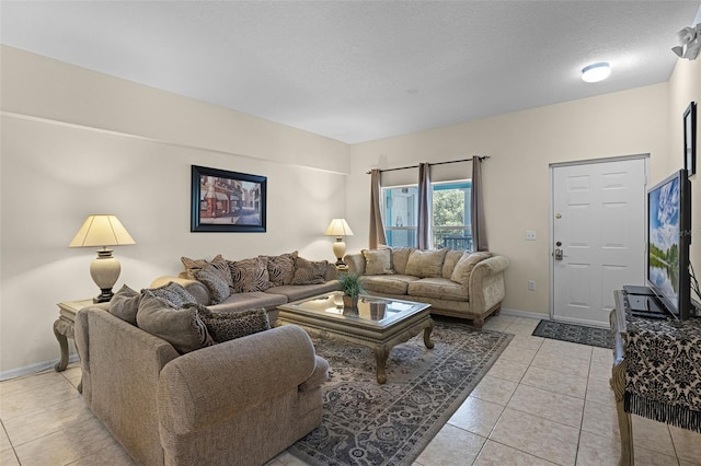 3111 Sun Lake Ct Unit B, Kissimmee, FL 34747 - living area with light tile patterned floors and a textured ceiling