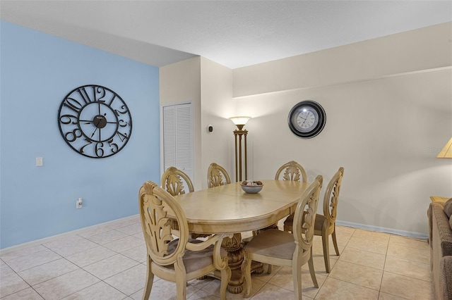 3111 Sun Lake Ct Unit B, Kissimmee, FL 34747 - dining space featuring light tile patterned floors and baseboards