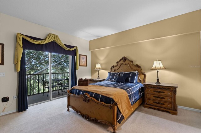 3111 Sun Lake Ct Unit B, Kissimmee, FL 34747 - carpeted bedroom with access to exterior and baseboards