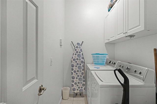 3111 Sun Lake Ct Unit B, Kissimmee, FL 34747 - laundry room featuring cabinet space, independent washer and dryer, and light tile patterned floors