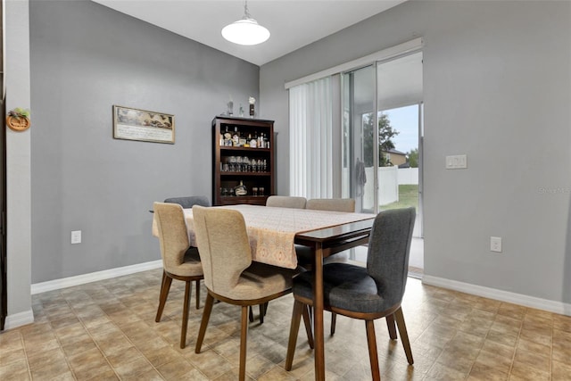 954 Revere Ave, Haines City, FL 33844 - dining area featuring baseboards