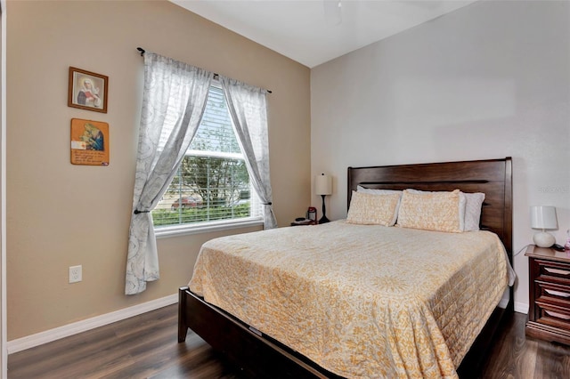 954 Revere Ave, Haines City, FL 33844 - bedroom featuring dark wood-type flooring and baseboards