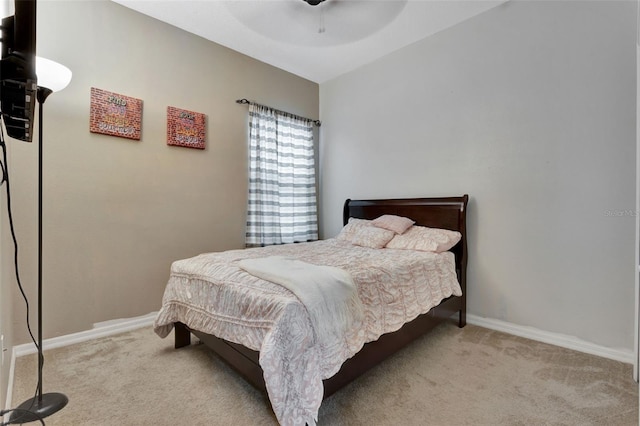 954 Revere Ave, Haines City, FL 33844 - carpeted bedroom with baseboards and a ceiling fan