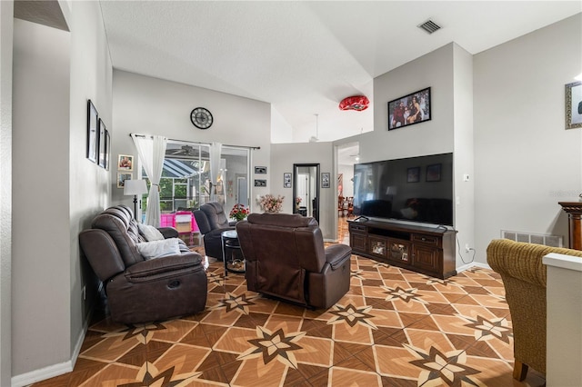 4428 Winding River Dr, Valrico, FL 33596 - living area featuring baseboards and high vaulted ceiling