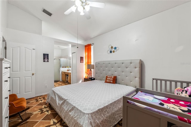 4428 Winding River Dr, Valrico, FL 33596 - bedroom featuring vaulted ceiling, ensuite bath, and a ceiling fan