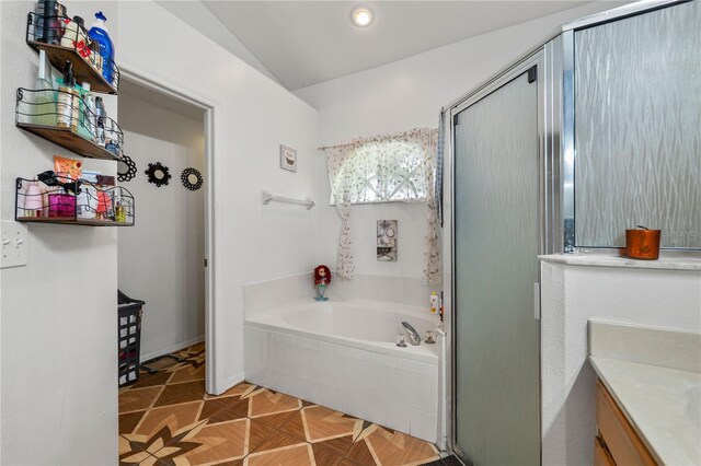 4428 Winding River Dr, Valrico, FL 33596 - full bath featuring a bath, a stall shower, vanity, recessed lighting, and vaulted ceiling
