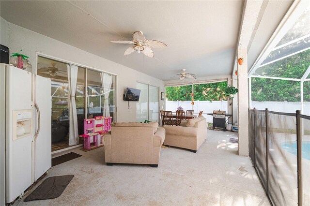 4428 Winding River Dr, Valrico, FL 33596 - sunroom / solarium with ceiling fan and outdoor dining space