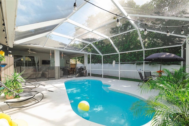 4428 Winding River Dr, Valrico, FL 33596 - view of swimming pool with a patio, ceiling fan, and a lanai