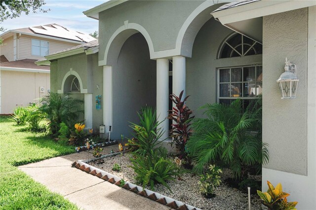 4428 Winding River Dr, Valrico, FL 33596 - view of exterior entry featuring stucco siding