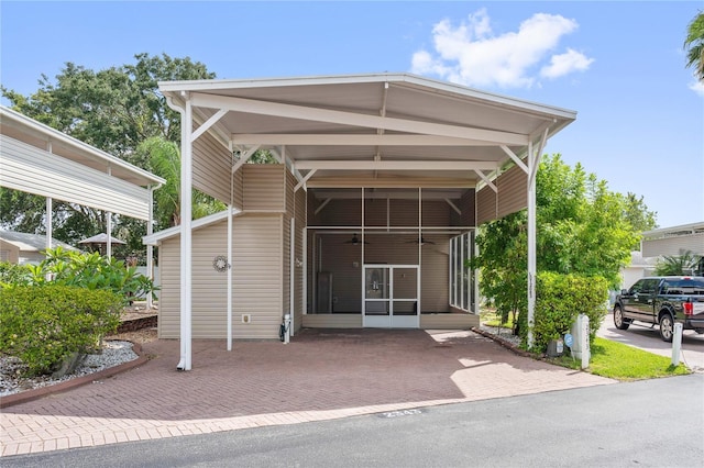 2343 St George Dr, Davenport, FL 33837 - view of car parking featuring a carport and driveway