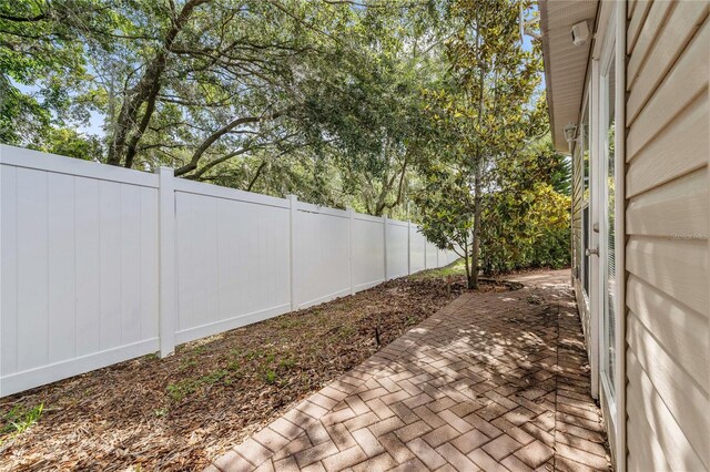 2343 St George Dr, Davenport, FL 33837 - fenced backyard featuring a patio