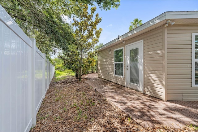 2343 St George Dr, Davenport, FL 33837 - view of yard featuring a patio area