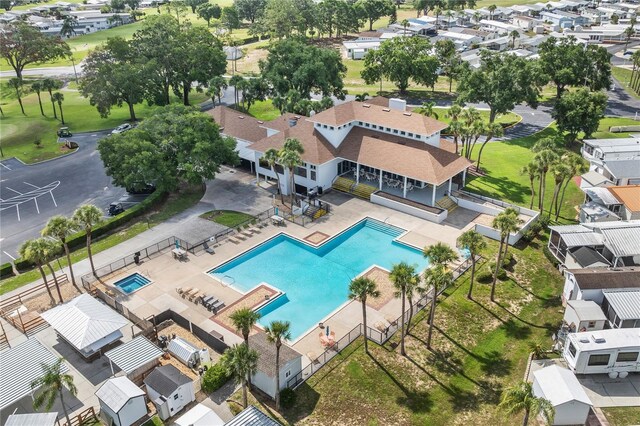 2343 St George Dr, Davenport, FL 33837 - aerial perspective of suburban area featuring a pool