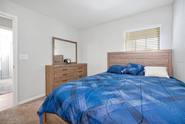 328 Lily Ln, Davenport, FL 33837 - carpeted bedroom with baseboards