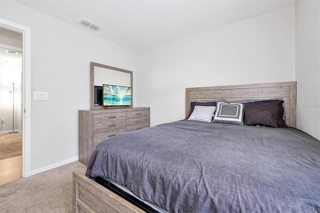 328 Lily Ln, Davenport, FL 33837 - bedroom featuring carpet floors and baseboards