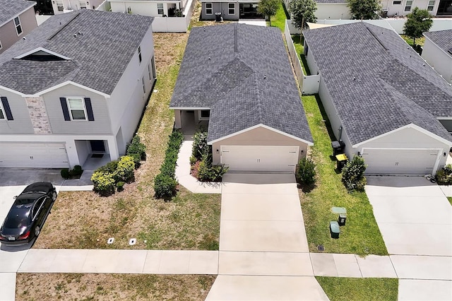 328 Lily Ln, Davenport, FL 33837 - aerial perspective of suburban area