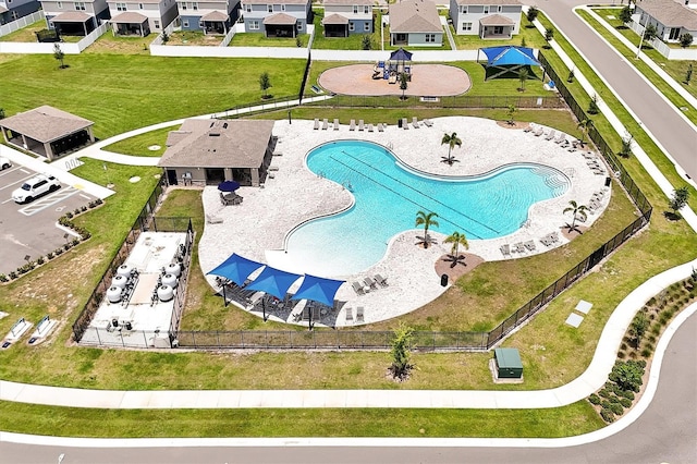 328 Lily Ln, Davenport, FL 33837 - aerial perspective of suburban area with a pool