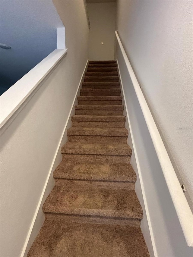 359 Arbor Lakes Dr, Davenport, FL 33896 - stairs featuring carpet floors