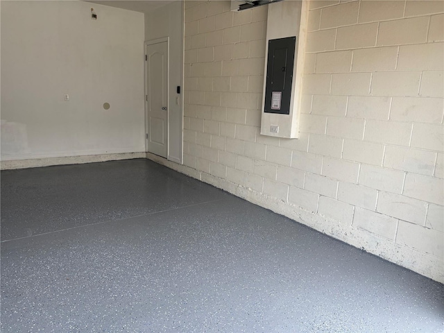 359 Arbor Lakes Dr, Davenport, FL 33896 - garage featuring concrete block wall and electric panel