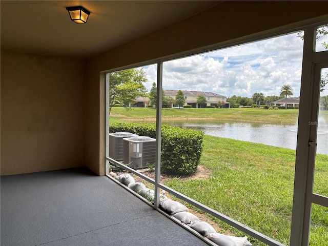 359 Arbor Lakes Dr, Davenport, FL 33896 - unfurnished sunroom with a water view