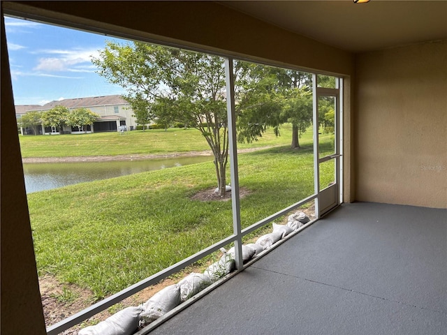 359 Arbor Lakes Dr, Davenport, FL 33896 - unfurnished sunroom with a water view
