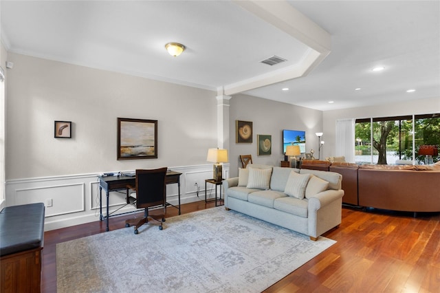 8401 Riverdale Ln Unit 8401, Davenport, FL 33896 - living room featuring wood finished floors, ornate columns, recessed lighting, and wainscoting