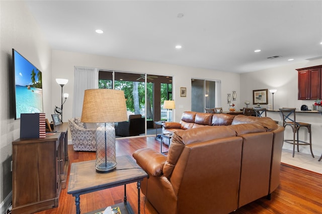 8401 Riverdale Ln Unit 8401, Davenport, FL 33896 - living area with wood finished floors and recessed lighting