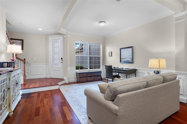 8401 Riverdale Ln Unit 8401, Davenport, FL 33896 - living area featuring ornamental molding, wainscoting, dark wood-style flooring, and a decorative wall