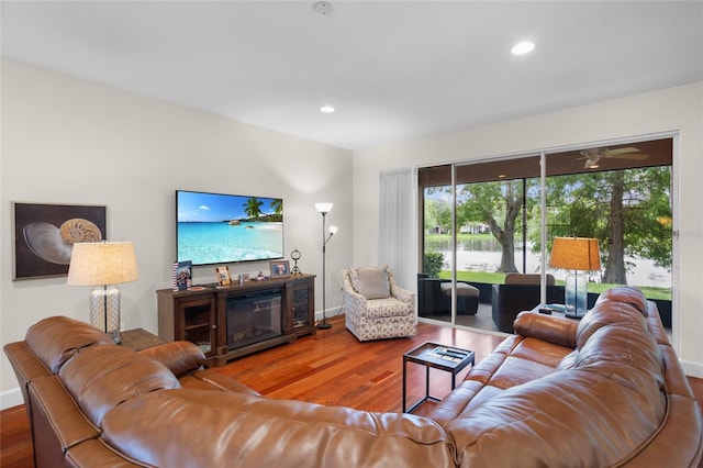 8401 Riverdale Ln Unit 8401, Davenport, FL 33896 - living area with wood finished floors, healthy amount of natural light, and recessed lighting