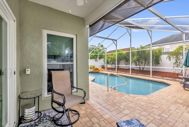 3214 Herons Point Cir, Kissimmee, FL 34741 - view of swimming pool with a patio area, a lanai, and a fenced backyard