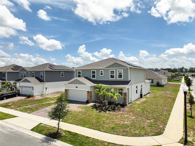2759 Slash Way, Saint Cloud, FL 34771 - view of front of house with board and batten siding, decorative driveway, roof mounted solar panels, and a residential view