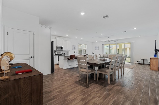 2759 Slash Way, Saint Cloud, FL 34771 - dining room with dark wood finished floors, a ceiling fan, and recessed lighting