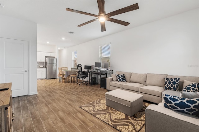 2759 Slash Way, Saint Cloud, FL 34771 - living area featuring a ceiling fan, wood finished floors, and recessed lighting