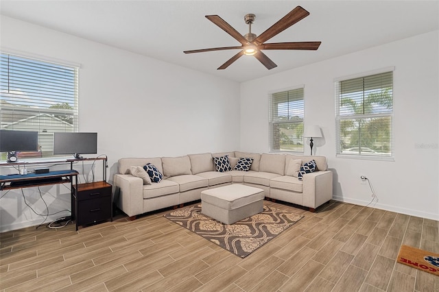 2759 Slash Way, Saint Cloud, FL 34771 - living room featuring light wood finished floors, ceiling fan, and a desk