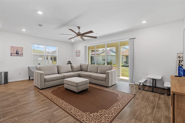 2759 Slash Way, Saint Cloud, FL 34771 - living area with wood finished floors, a ceiling fan, and recessed lighting