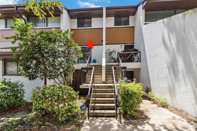 4570 Tower Pine Rd Ge, Unit Ge, Orlando, FL 32839 - view of property featuring stairs