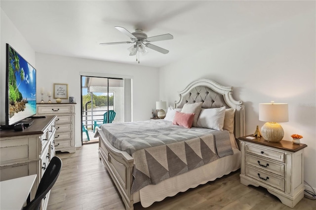4570 Tower Pine Rd Ge, Unit Ge, Orlando, FL 32839 - bedroom with access to exterior, light wood finished floors, and a ceiling fan