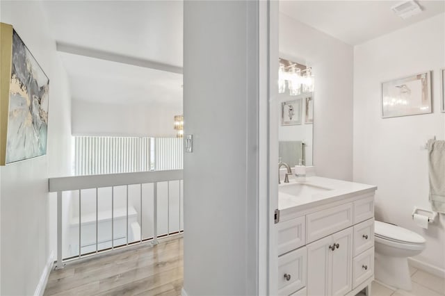 4570 Tower Pine Rd Ge, Unit Ge, Orlando, FL 32839 - bathroom featuring vanity and wood finished floors