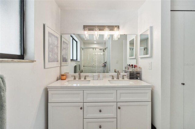 4570 Tower Pine Rd Ge, Unit Ge, Orlando, FL 32839 - full bathroom featuring a stall shower and double vanity