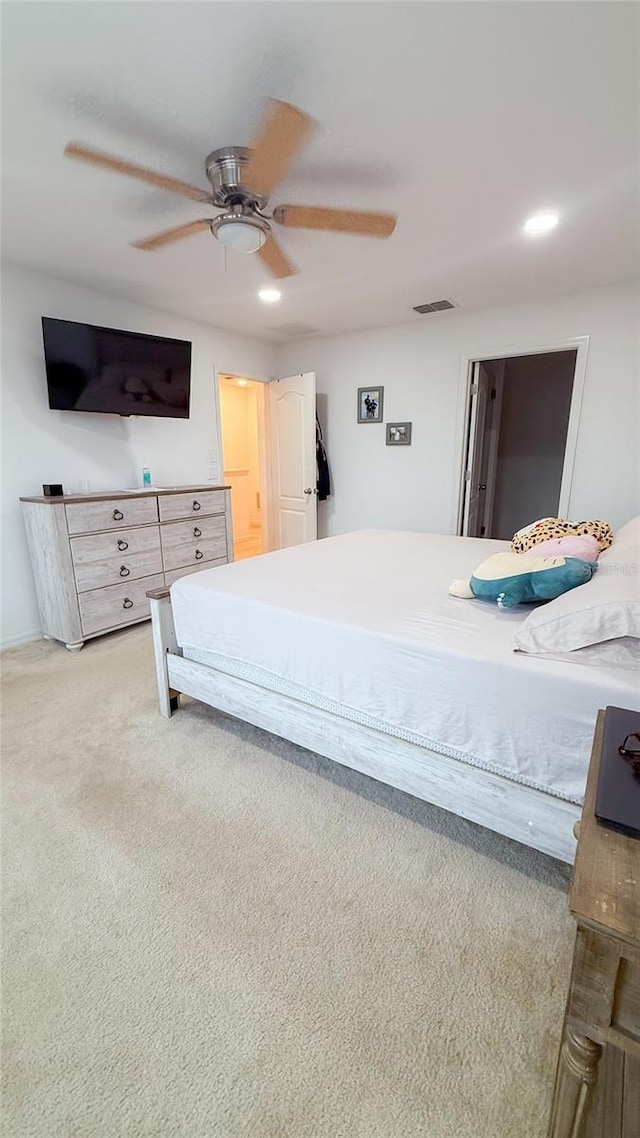 721 Benoi Dr, Davenport, FL 33896 - bedroom with ceiling fan, light carpet, and recessed lighting