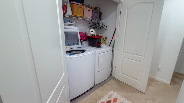 721 Benoi Dr, Davenport, FL 33896 - washroom featuring washer and clothes dryer and light colored carpet