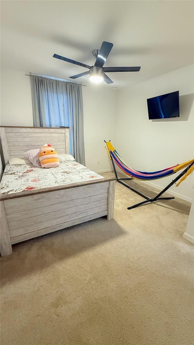 721 Benoi Dr, Davenport, FL 33896 - bedroom featuring carpet floors and ceiling fan