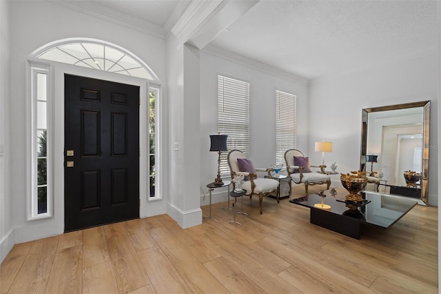 933 Jasmine St, Celebration, FL 34747 - foyer entrance featuring light wood-style floors and ornamental molding